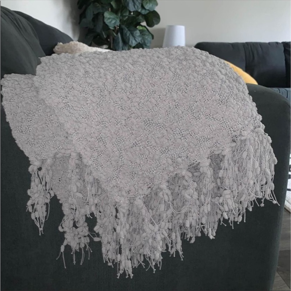 Gray tassel throw blanket